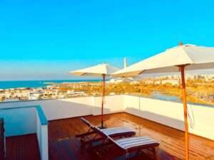 Luxury penthouse for sale near Park HaYarkon, featuring rooftop terrace, sea views, and premium amenities.