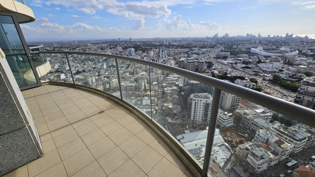 Luxury 3-room apartment in Neve Tzedek Tower, Tel Aviv, featuring panoramic views, a sun balcony, and premium amenities.