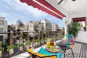 Balcony with city views in a renovated apartment for sale near Hilton Beach Tel Aviv