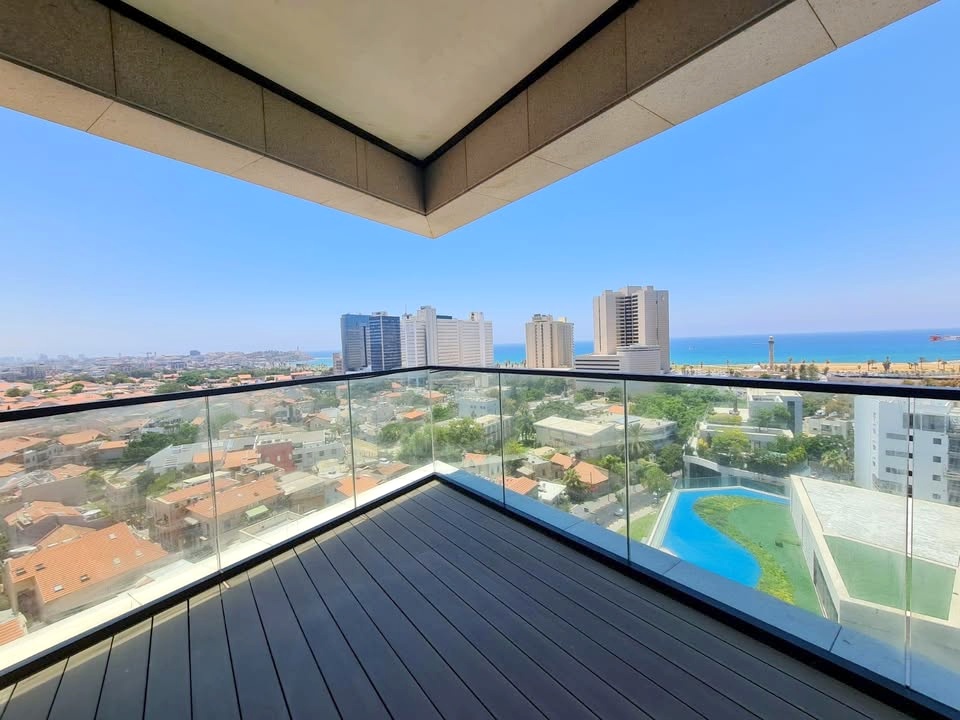 Balcony of White City Tower apartment overlooking the Mediterranean Sea.