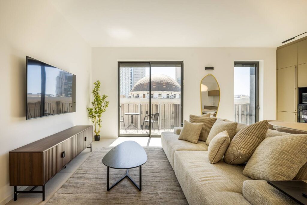 Open living and kitchen area in furnished 2-room apartment Piano House