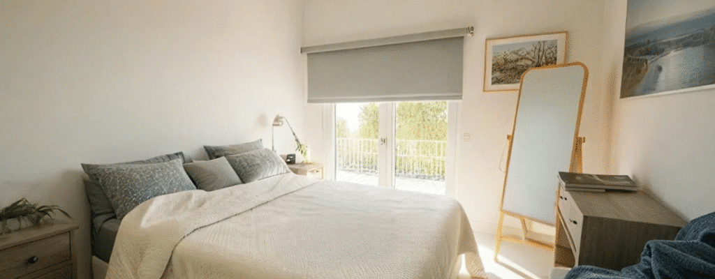 Bright master bedroom with private balcony in Assuta Village apartment