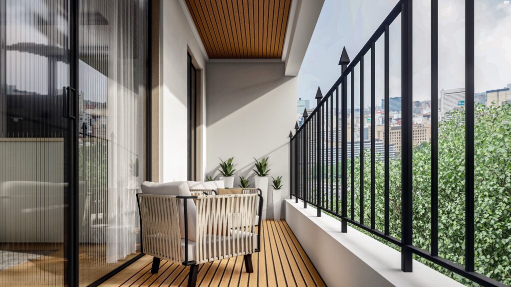 Balcony with seating and greenery view in Tel Aviv apartment