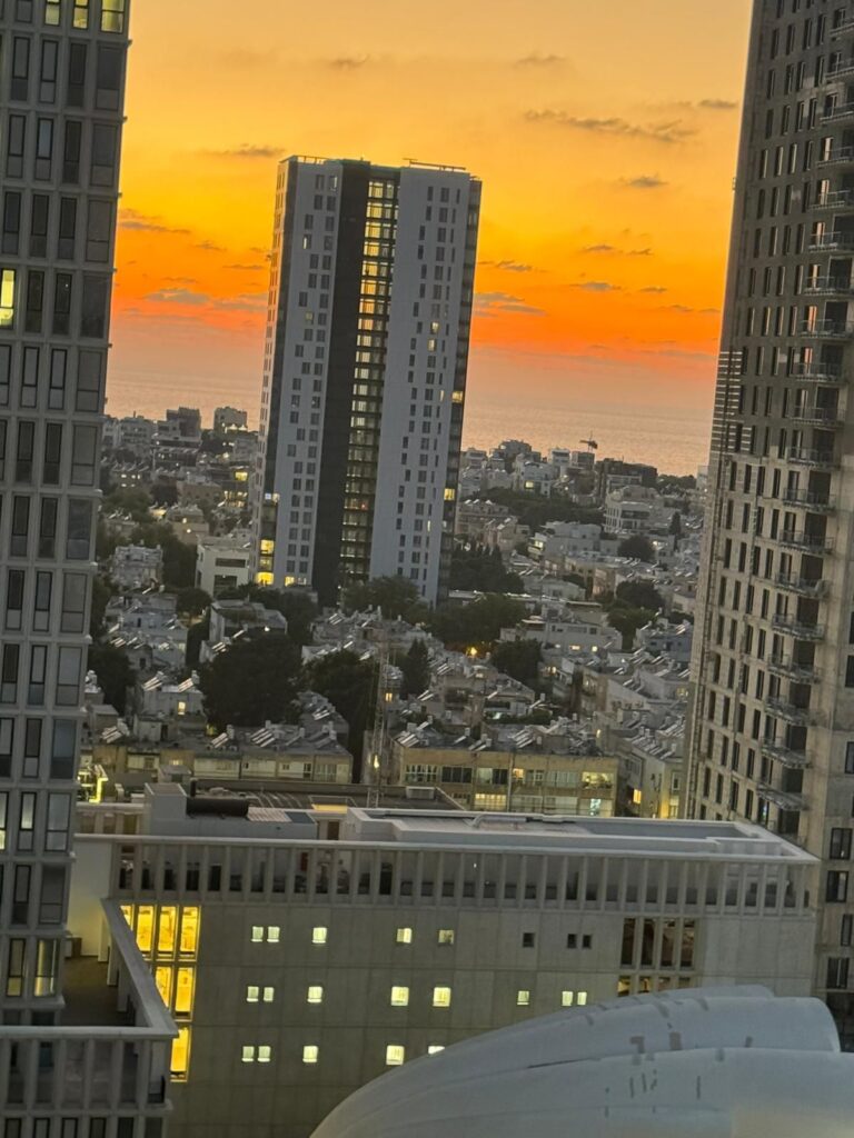 High-floor sunset view from Gymnasia Tower in Tel Aviv