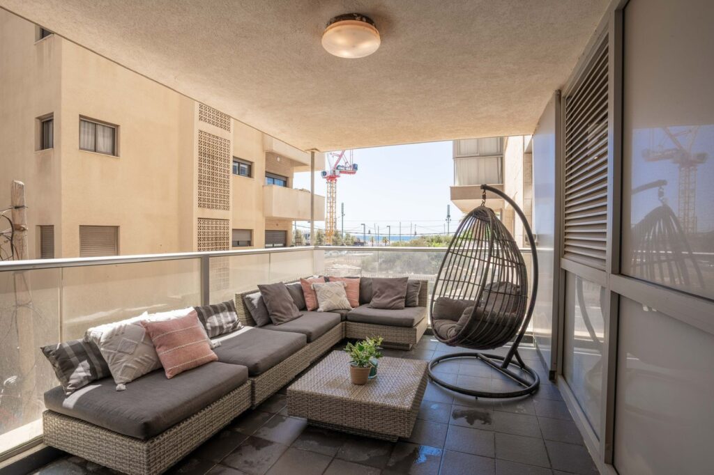 Sea view balcony with outdoor furniture Hayarkon apartment for sale