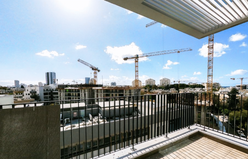 Balcony view of Tel Aviv skyline with sea in the background
