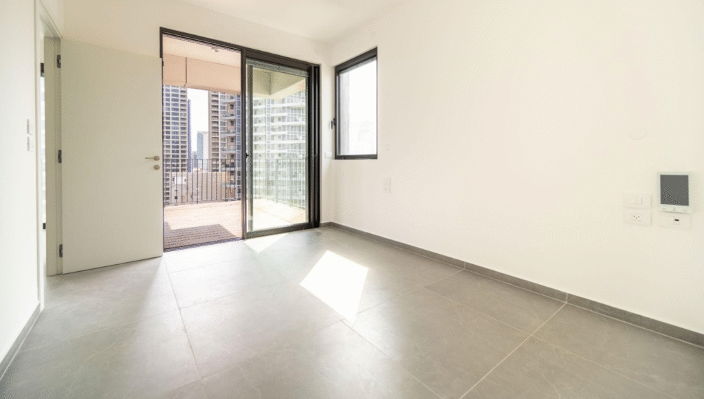 Bright modern bedroom with large windows and balcony access