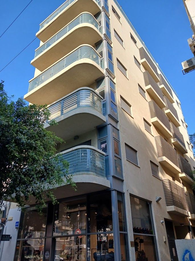 Exterior of boutique building with balconies in Tel Aviv