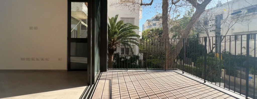 Terrace and green view from boutique apartment in Tel Aviv