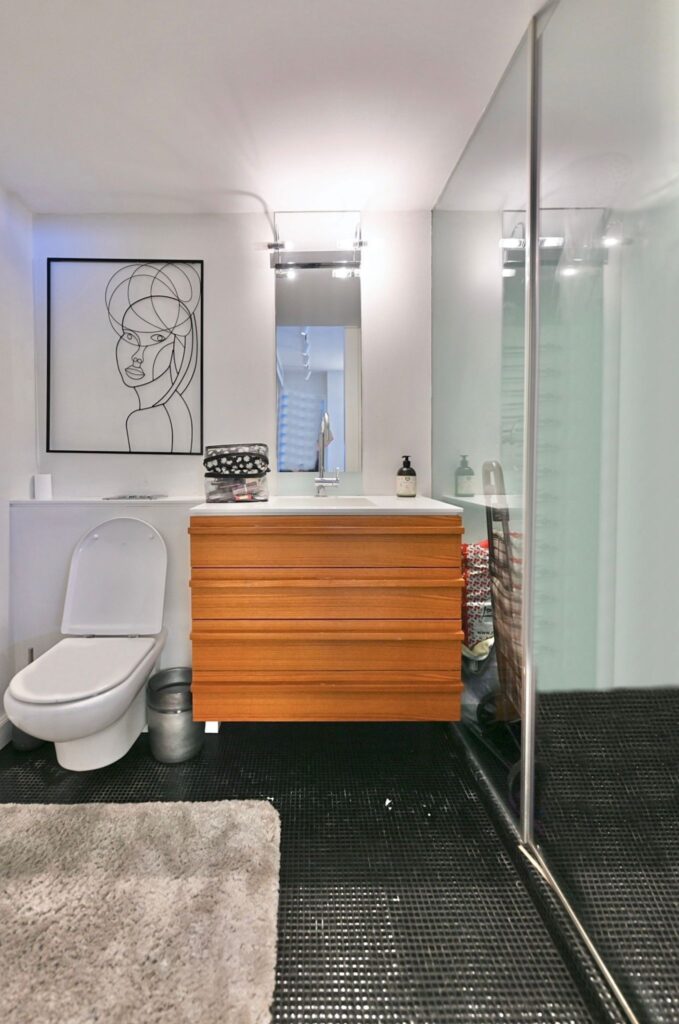 Modern guest bathroom with designer vanity in Tel Aviv apartment