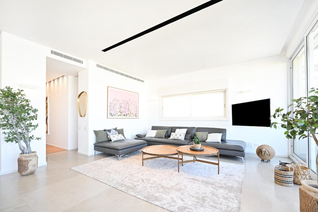 Luxury furnished living room with modern décor in Tel Aviv penthouse