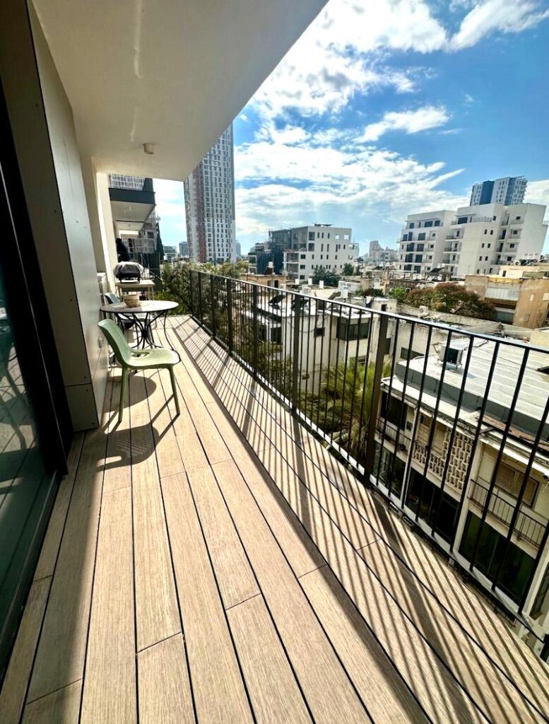 pacious balcony with open view in Old North Tel Aviv apartment