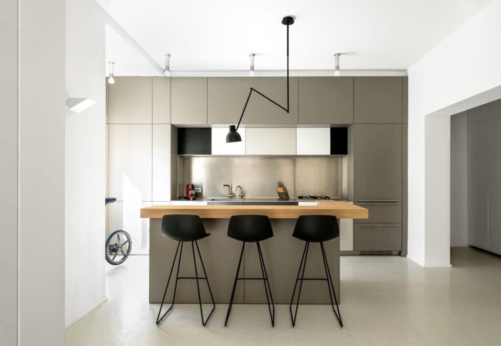 Designer kitchen with Bulthaup cabinets and wooden island in Tel Aviv apartment