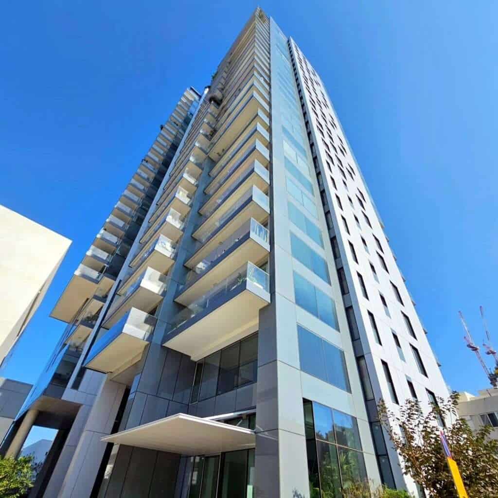 Assuta Village luxury tower exterior in Tel Aviv Basel area