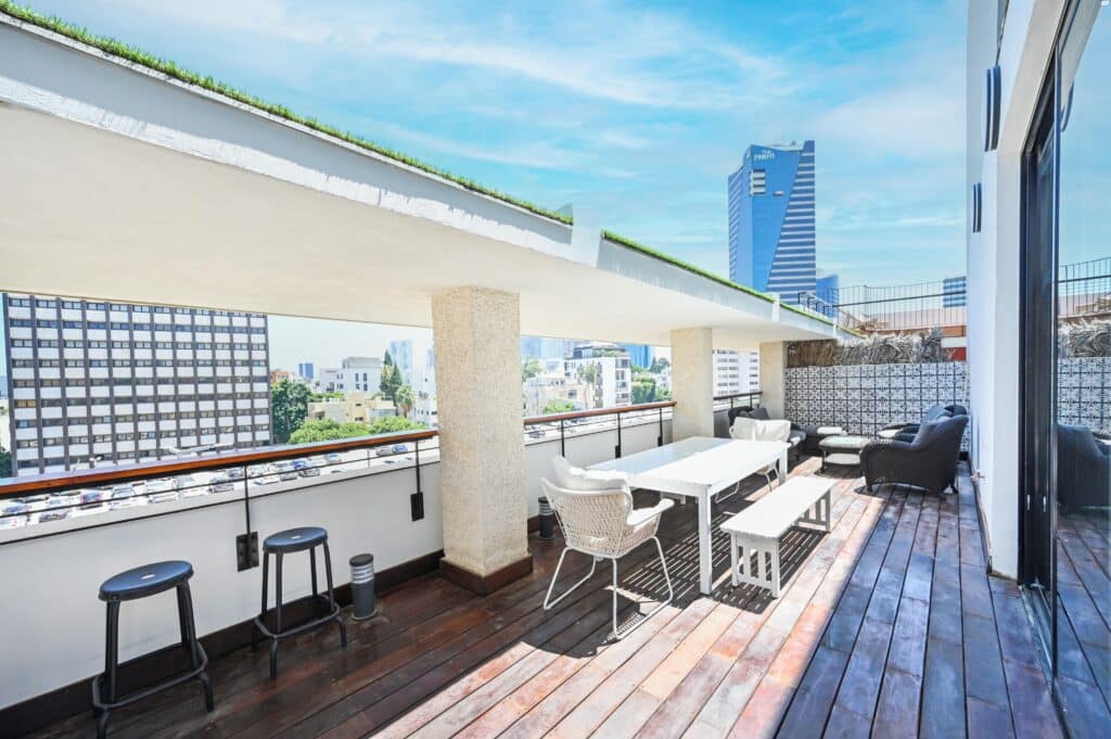 Rooftop terrace in designer penthouse with skyline views in Tel Aviv
