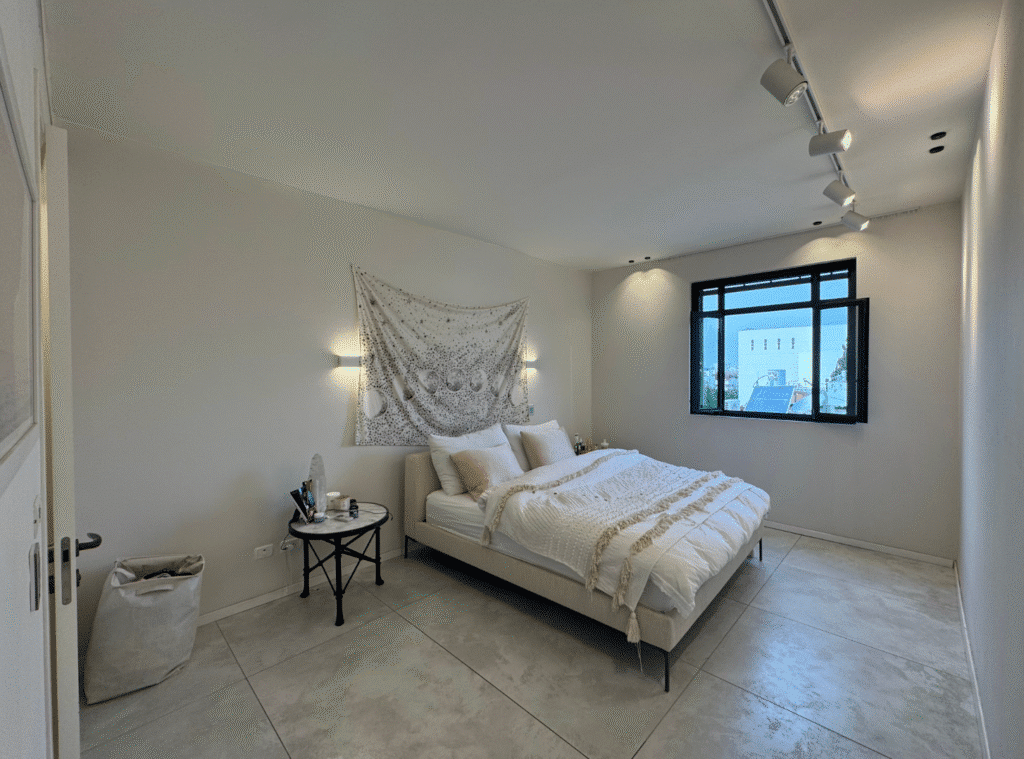 Minimalist bedroom with natural light and modern design