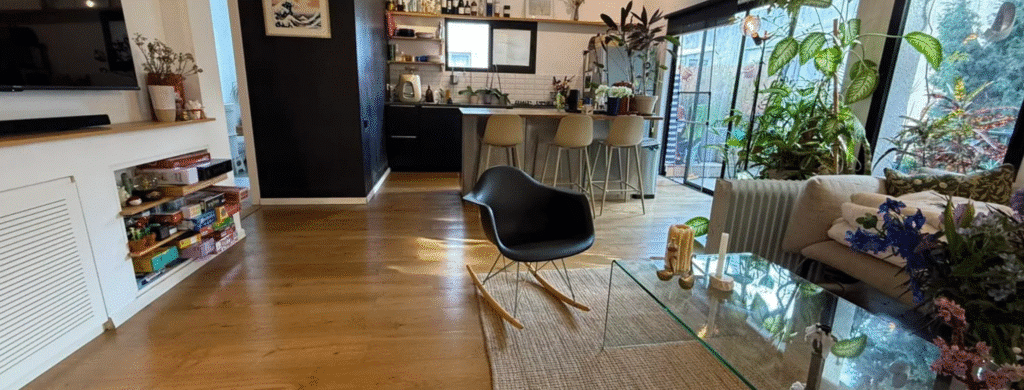 Elegant living room with parquet floors and tree view