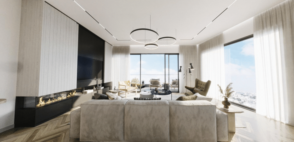 Luxury living room with full-height windows and modern furnishings in Tel Aviv apartment
