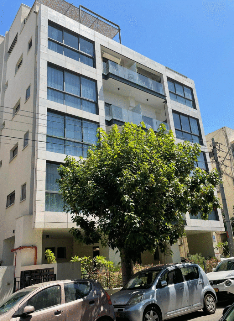 Modern building exterior on Ovadia Mibartenura Street in Tel Aviv