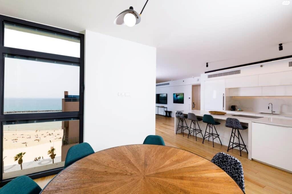 Open-plan living and dining area with ocean view