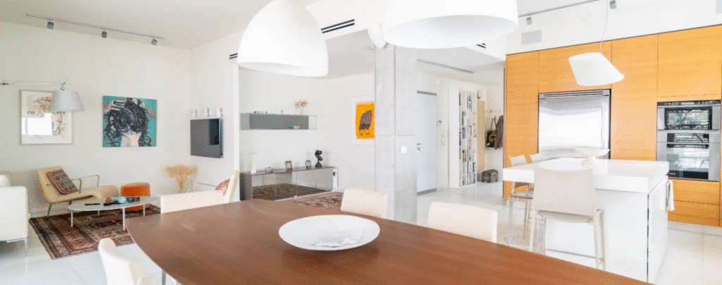 Spacious modern living room and kitchen in Tel Aviv apartment for sale