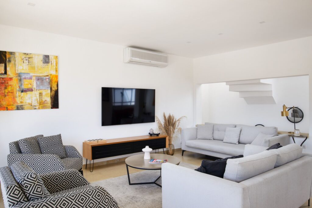 Comfortable living room with modern furniture in Tel Aviv short term rental