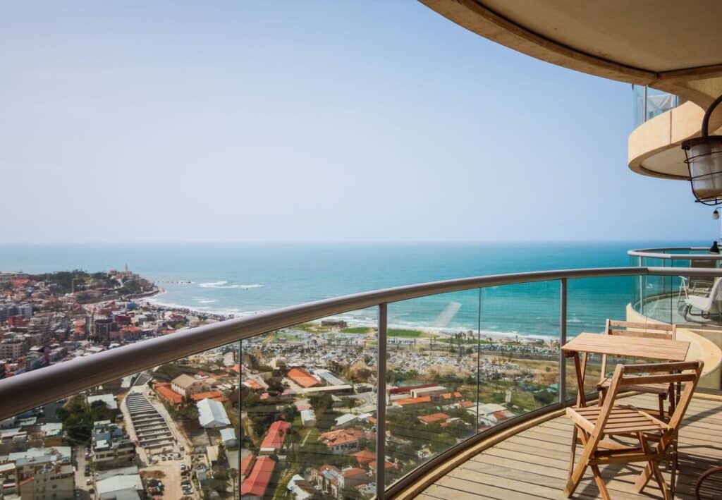 Panoramic Mediterranean view from furnished balcony in Neve Tzedek Tower