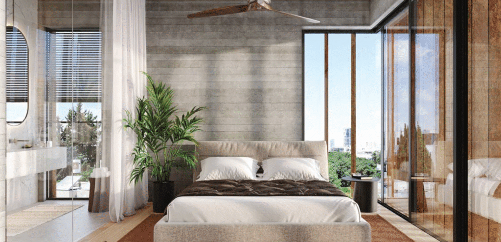 Sunlit master bedroom with luxury finishes in Rothschild penthouse