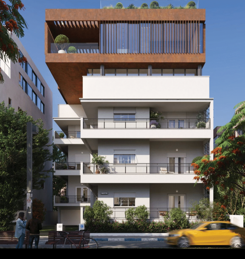 Renovated building facade with modern top floor penthouse in Tel Aviv