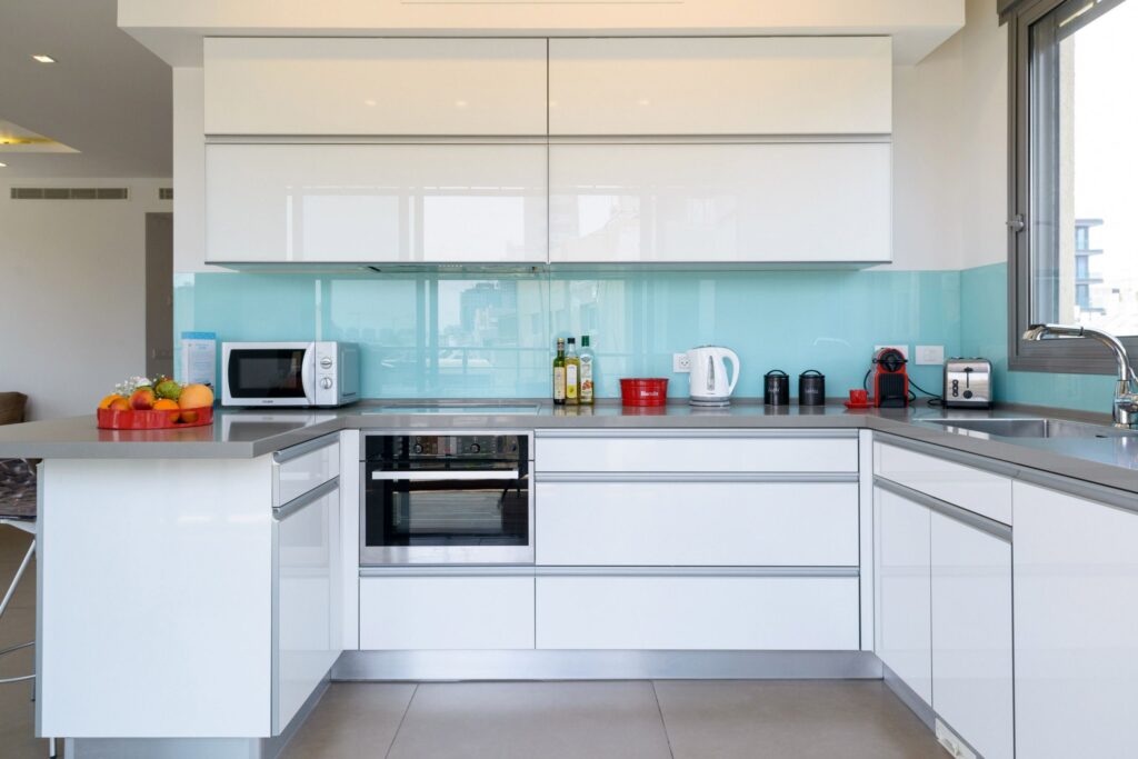 Contemporary kitchen with sleek cabinetry and appliances