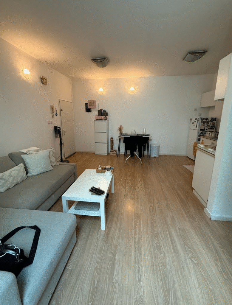 Open-plan living and dining space with parquet floors