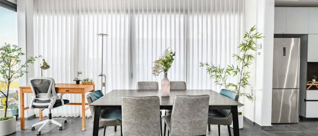 Bright dining and workspace in rental apartment near Habima