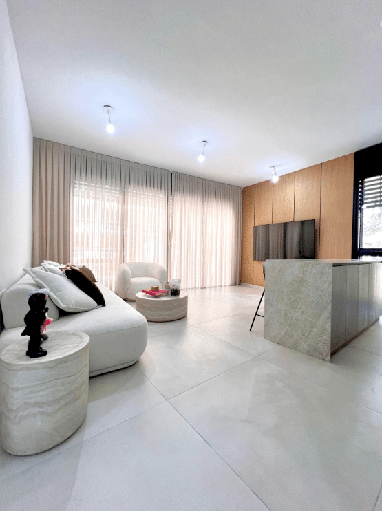 Elegant living space with TV and designer furnishings